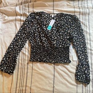 Nine Britton Wrap-style top with smocked bottom S